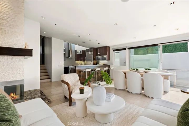 Living areas with ocean views through floor-to-ceiling windows.