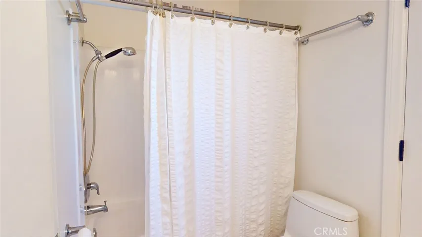 Hallway bath has a Tub/Shower combination