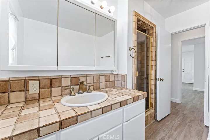 Same bathroom with shower