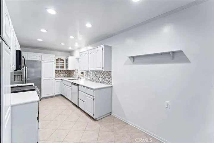 Kitchen view seven, with small dining area
