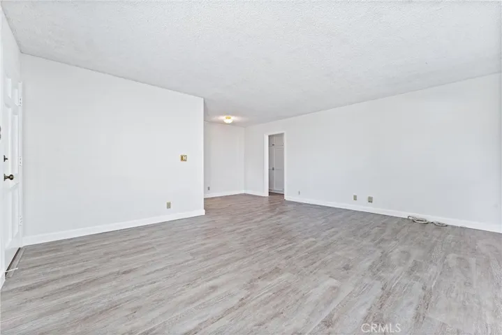 Living room view one, with dining room