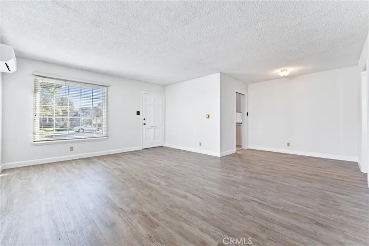 Living room view two, with dining room