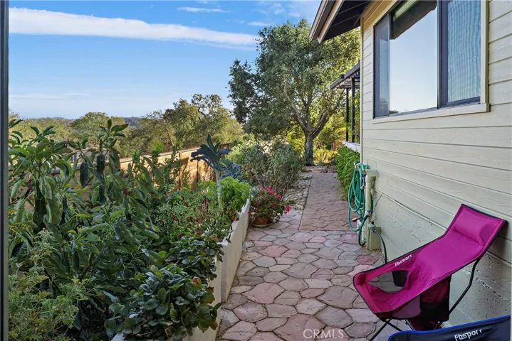 Enter your beautifully maintained garden with fruit and veggies galore- less wind in the area and the perfect light to grow your favorites.