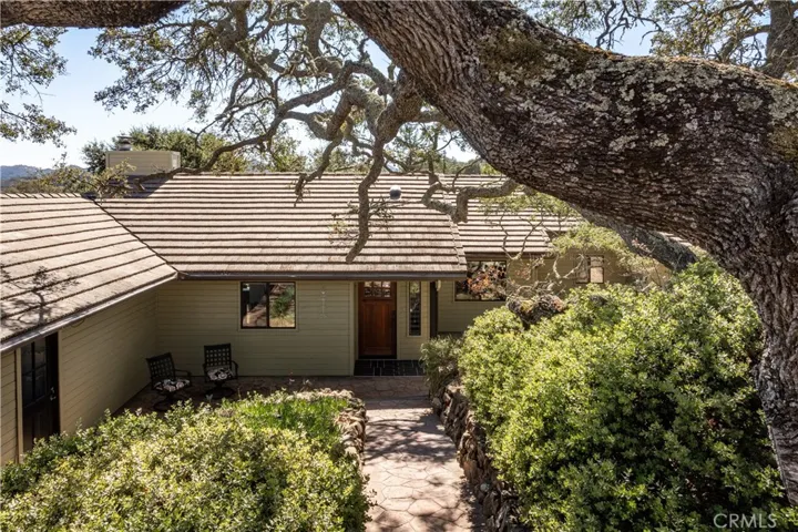 Welcome to 10675 Realito Ave surrounded by the most amazing oak trees.
