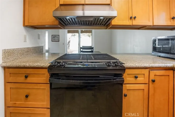 Newer Gas Stove, Newer
Parriott Wood Cabinets