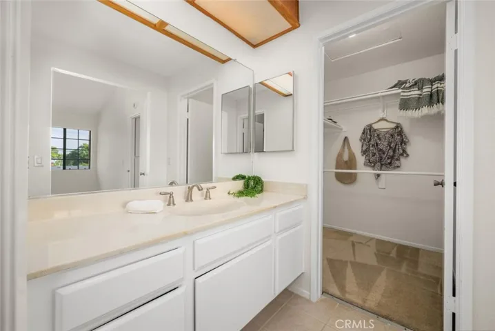 Main bedroom has ensuite bathroom and walkin closet, large vanity areas