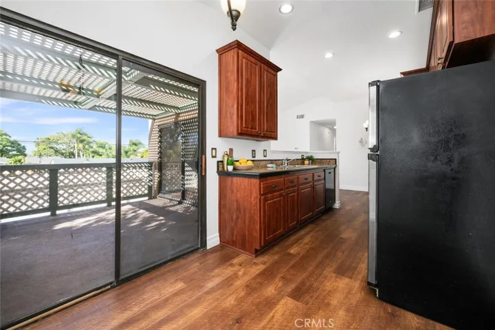 Lots of natural light pours in through the two large sliders in the kitchen and living room.