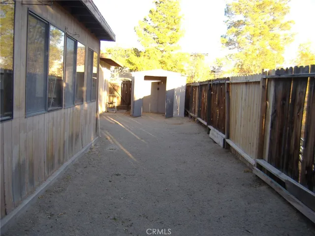 Fenced rear yard with much more room beyond
