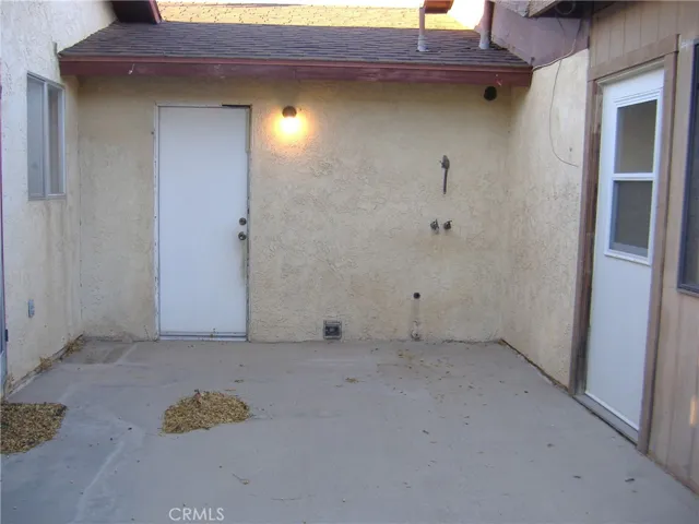 Back area with doors to Great Room and Patio