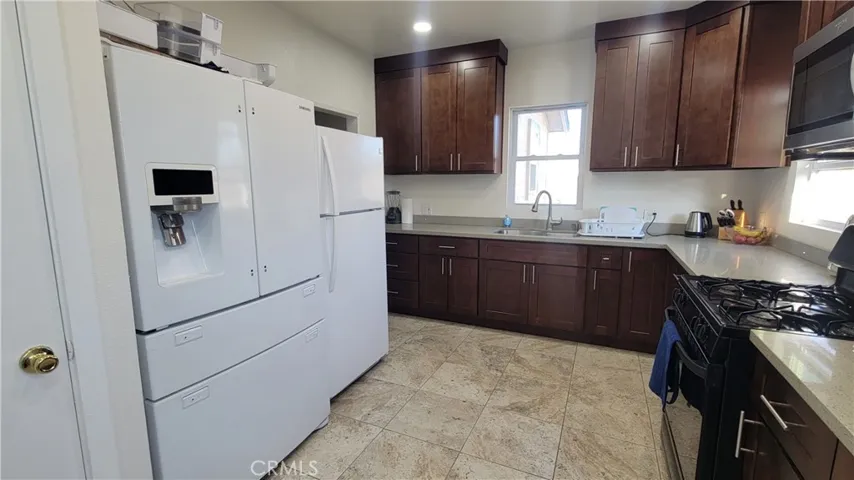 Shared kitchen with two refrigerators