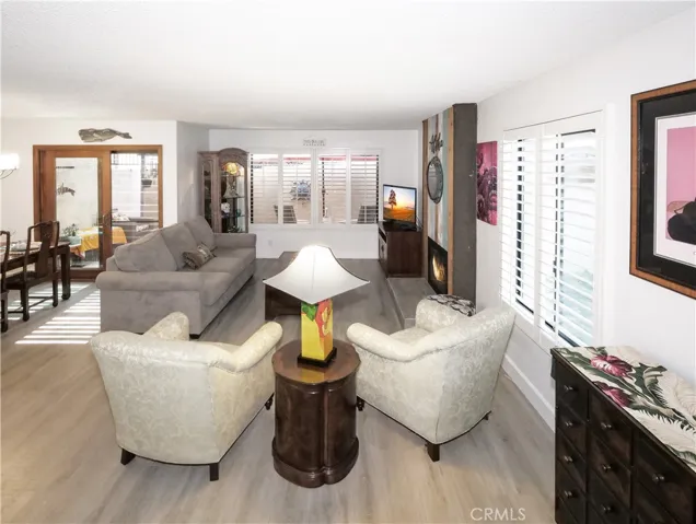 Living Room and Dining Room Leads to Patio