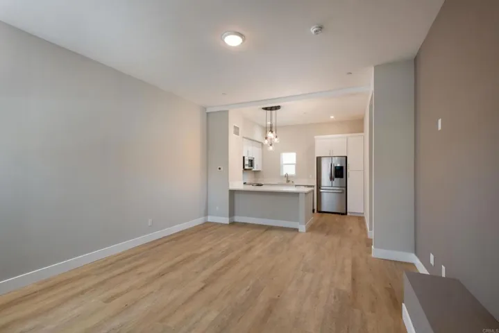 Open Floor Plan w/ Living Room and Kitchen