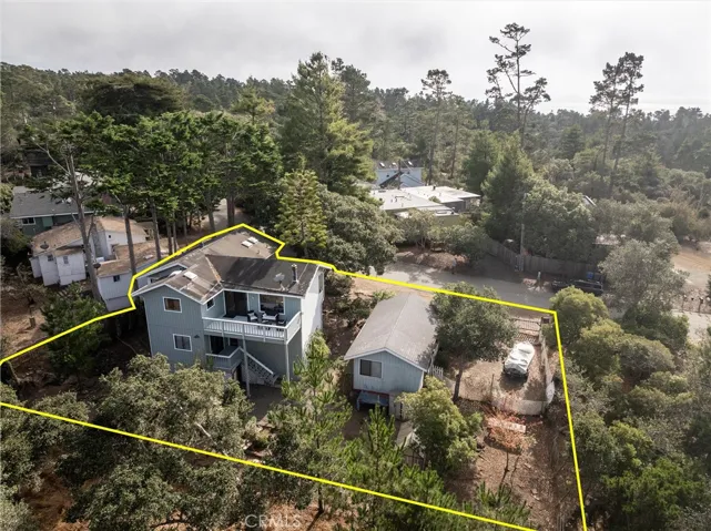 Drone shot of property from back of property.
