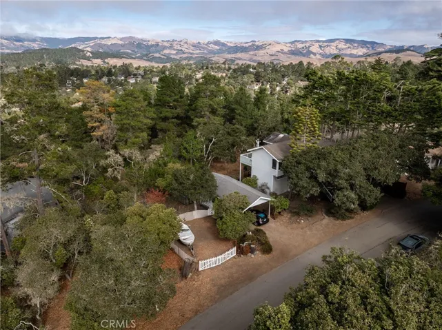Higher view of property showing view of hills as well.