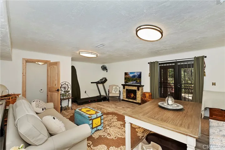 fire in fireplace & picture on TV screen were both added digitally