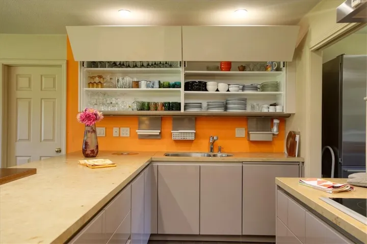 Cabinets hinge open, offer tons of storage