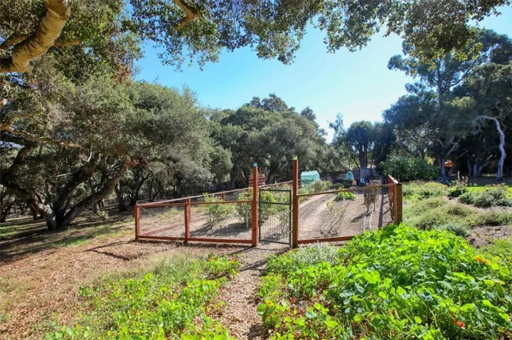 Fenced garden area in front of main house