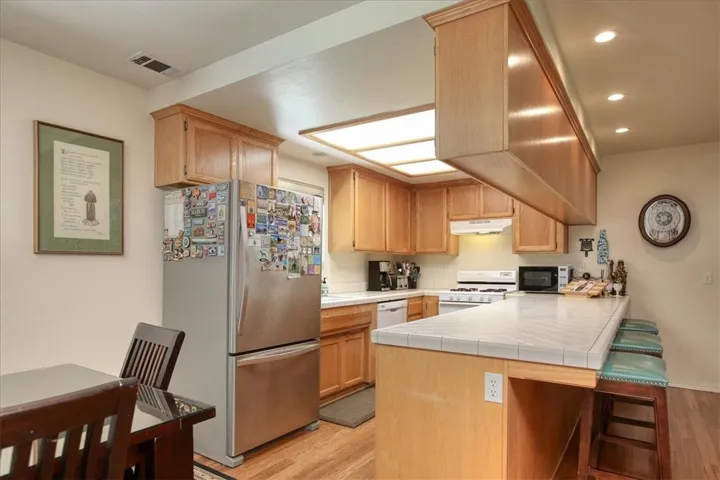 Kitchen has breakfast bar seating