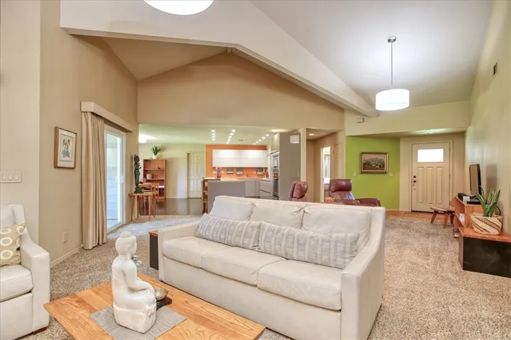 Open concept. Alcove near front door leads to guest bathroom.