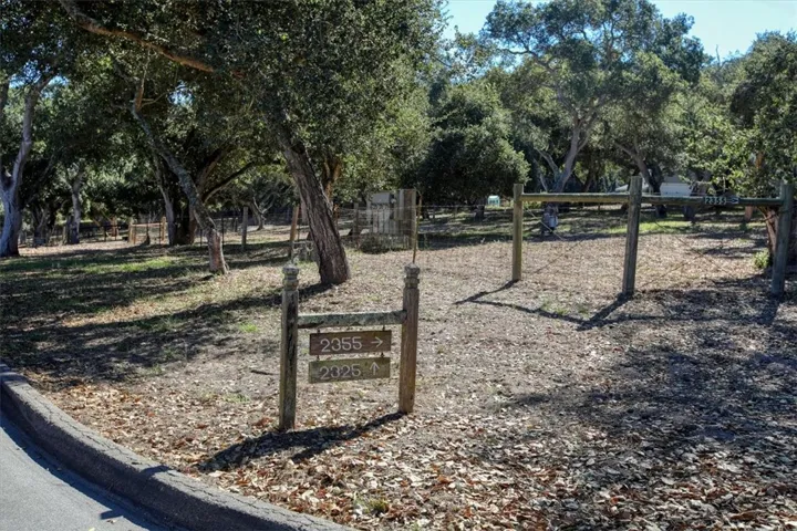 Separate driveways with gates. 2 addresses.