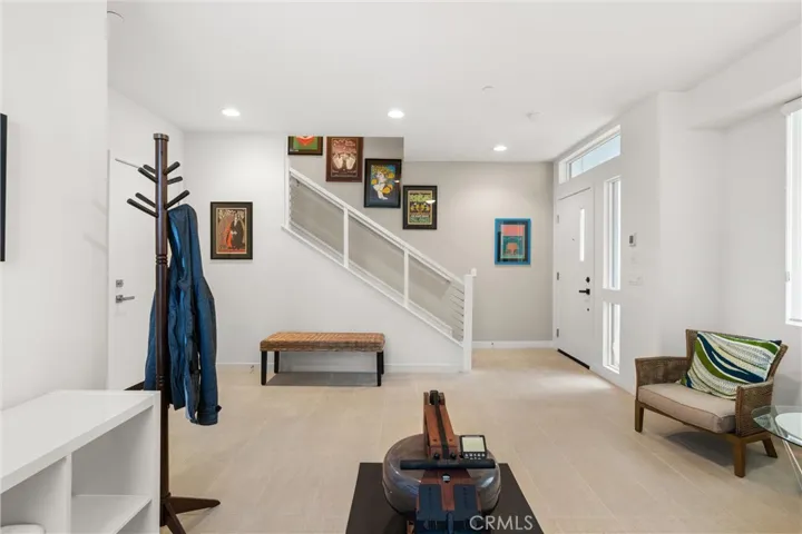 Ground floor entry area with garage access