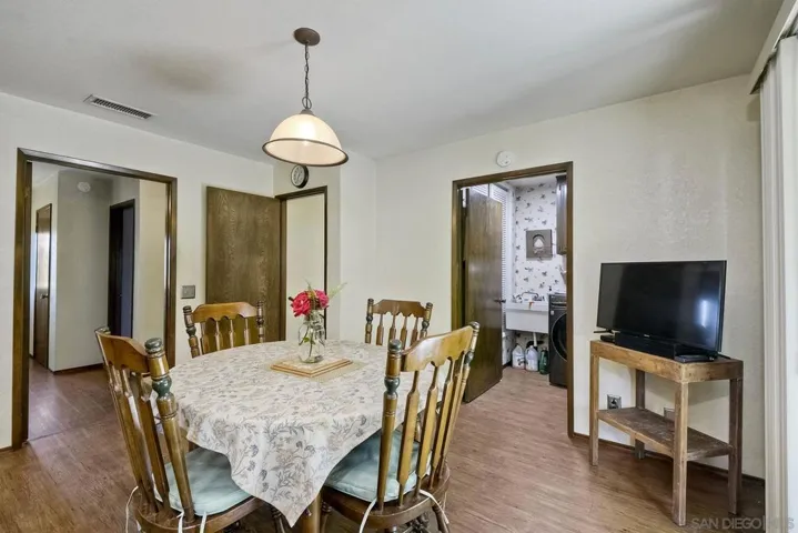 Dining area showing entry to bonus room