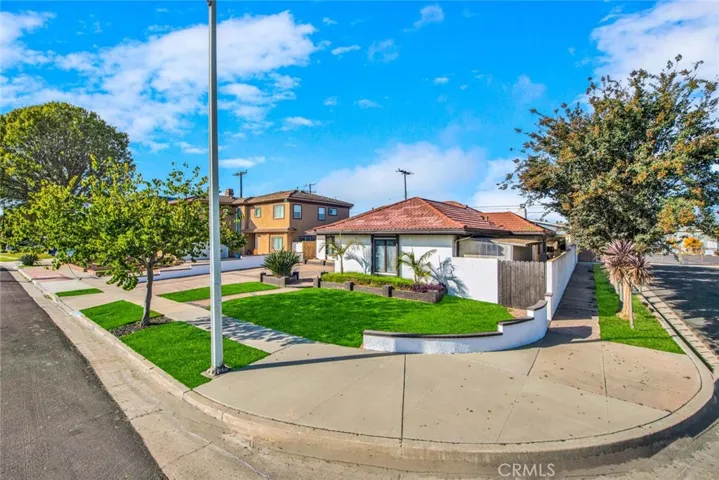 This stunning single-story pool house with built in BBQ is located on a corner lot of a quiet cul-de-sac.