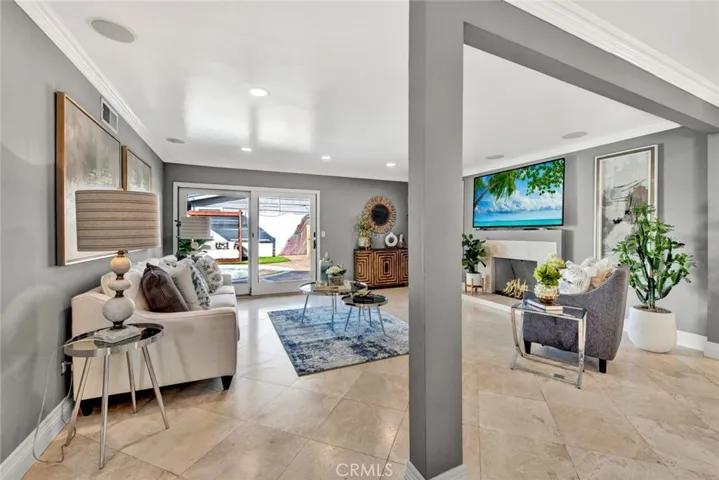dual-pane windows, and glass slider doors that open to the backyard oasis