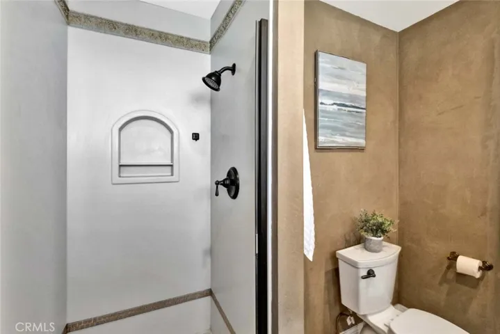 walk-in shower with glass doors