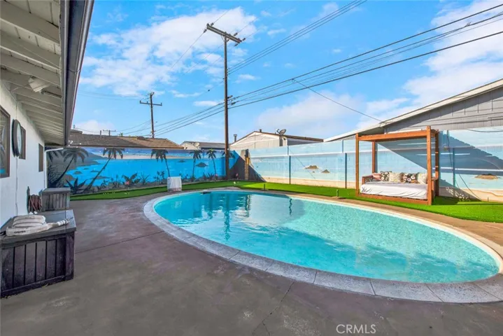 Step into your backyard oasis, where a sparkling pool