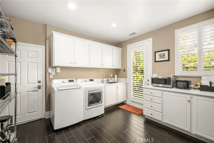 Huge Laundry Room can be used as a  Craft or Art Room or additional Office