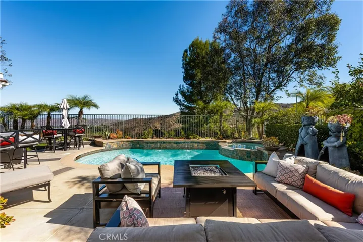 Backyard Patio with Light Table, Pool and Spa and Unobstructed Views