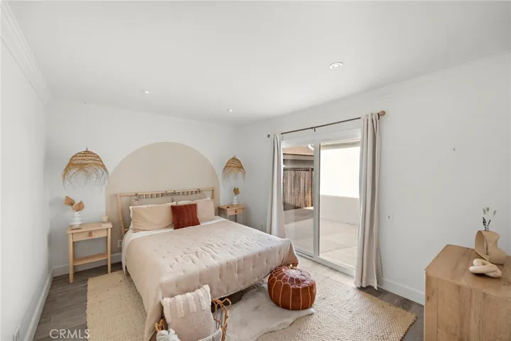 Bedroom 2  featuring sliding door to private patio