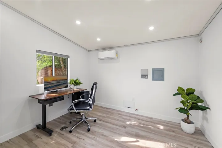 Interior of shed featuring new paint, recessed lights