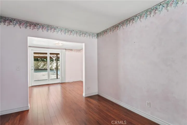 Bedroom at rear with patio access
