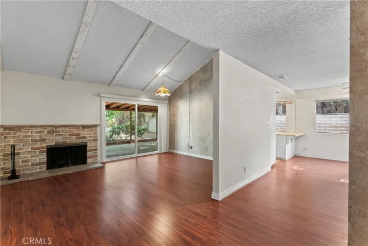 Laminate floors throughout except kitchen and baths