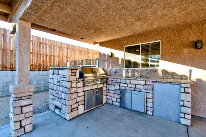 Outdoor kitchen with Jenn-Air gas BBQ
