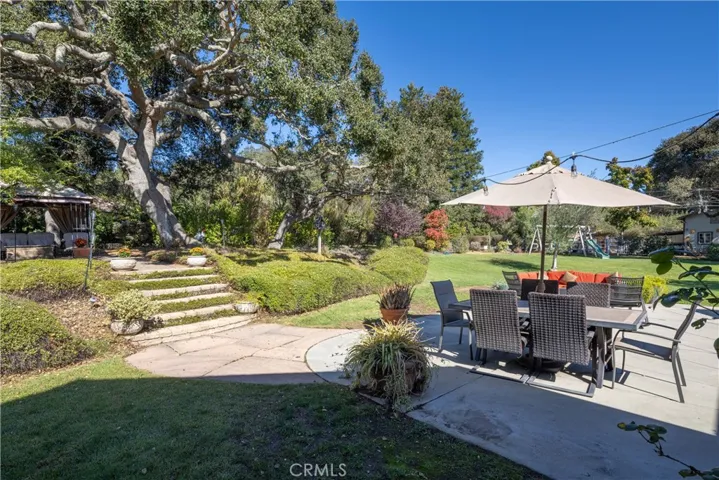 3 over 100 year old oaks in the incredible backyard.