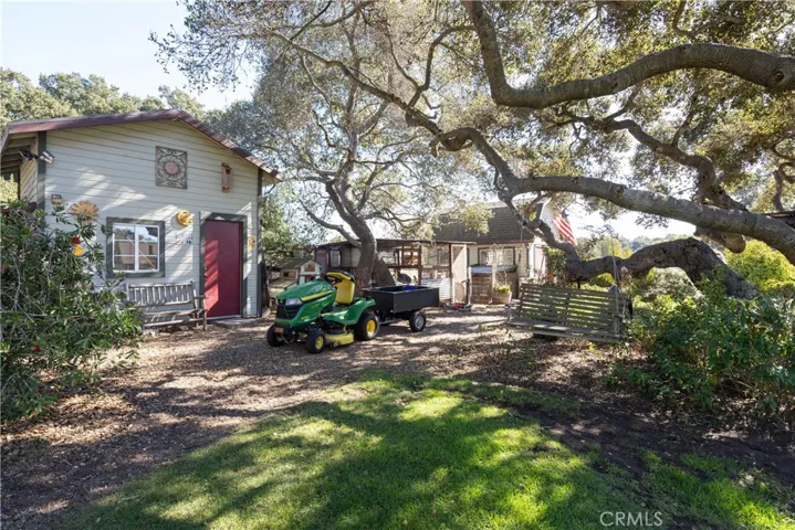 Outbuildings an animal pens.