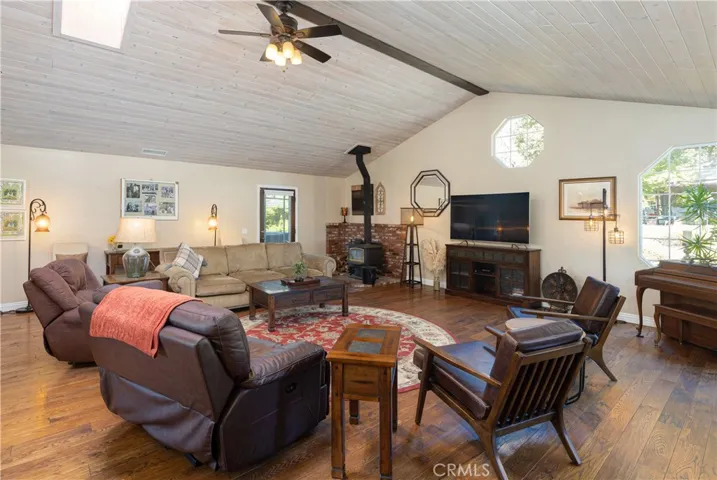Tall ceilings and wood burning stove.