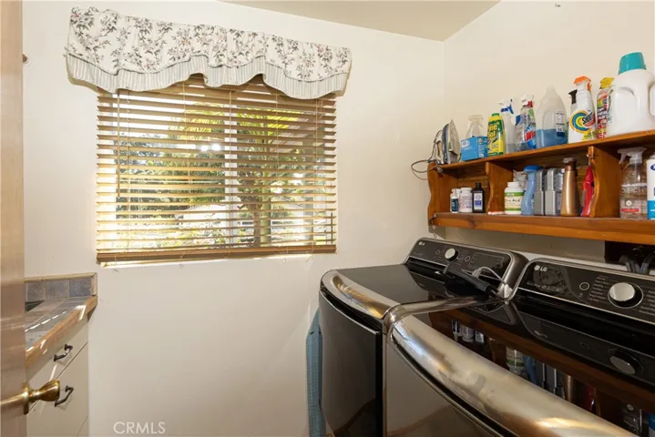 Laundry room off of kitchen.