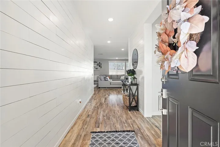 Beautiful entryway with shiplap walls.