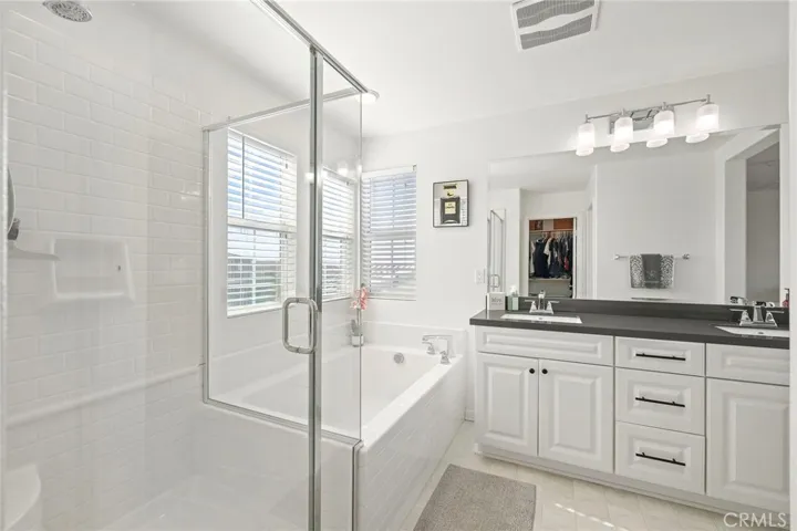 Separate walk-in shower and soak-in tub.