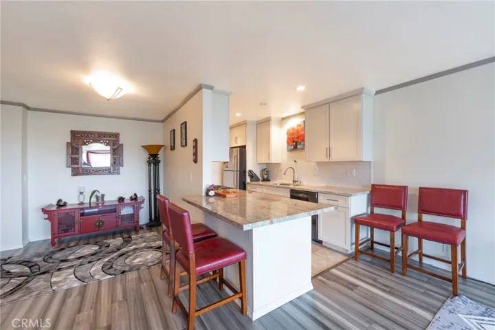 Breakfast bar or work area to enjoy in the open living room area