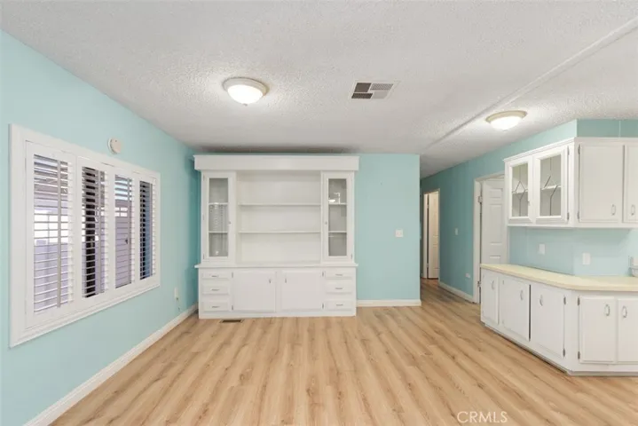 Living Room / Family room = off to kitchen