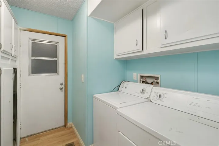 Laundry room w/ washer & dryer