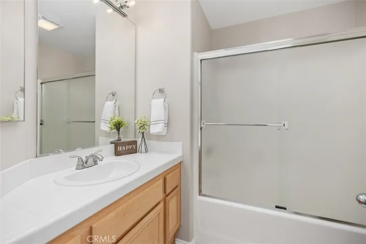 Secondary bathroom upstairs with tub shower combo