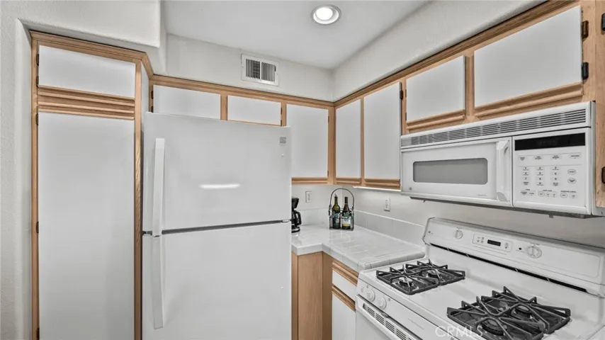 Roomy kitchen with loads of cabinet and counter space