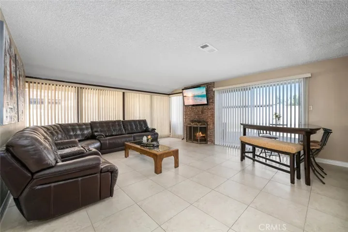 Large open living room with plenty of natural light.