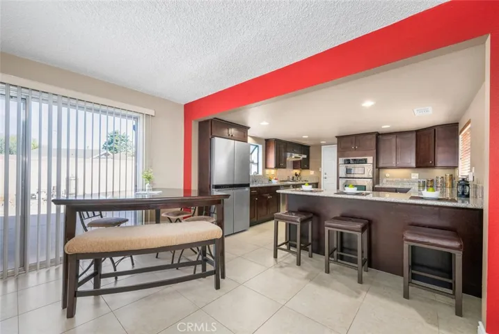 Dining area overlooks the yard.